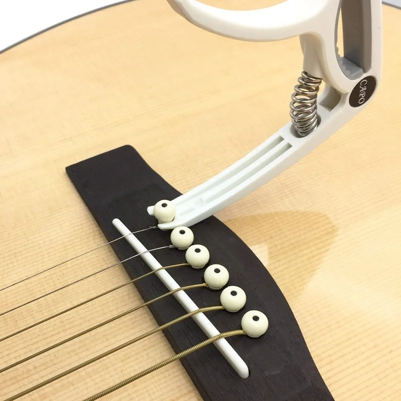 プラスチックギターカポ 6 弦アコースティッククラシックエレ - Guitar Tuner Clip のレビューと価格